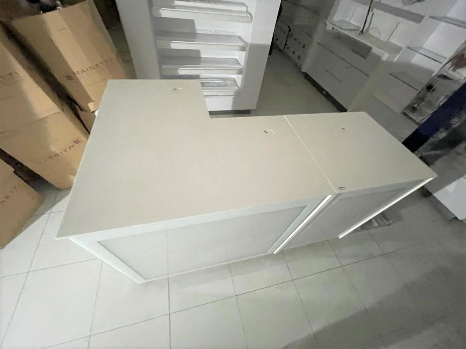 1 x L Shape Retail Counter in White With Advertising Light Boxes and Storage Cabinets With Cable - Image 11 of 19