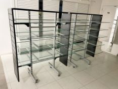 2 x Mobile Retail Display Units in Black Featuring 10 Glass Shelves, Side Slat Board and Full Height