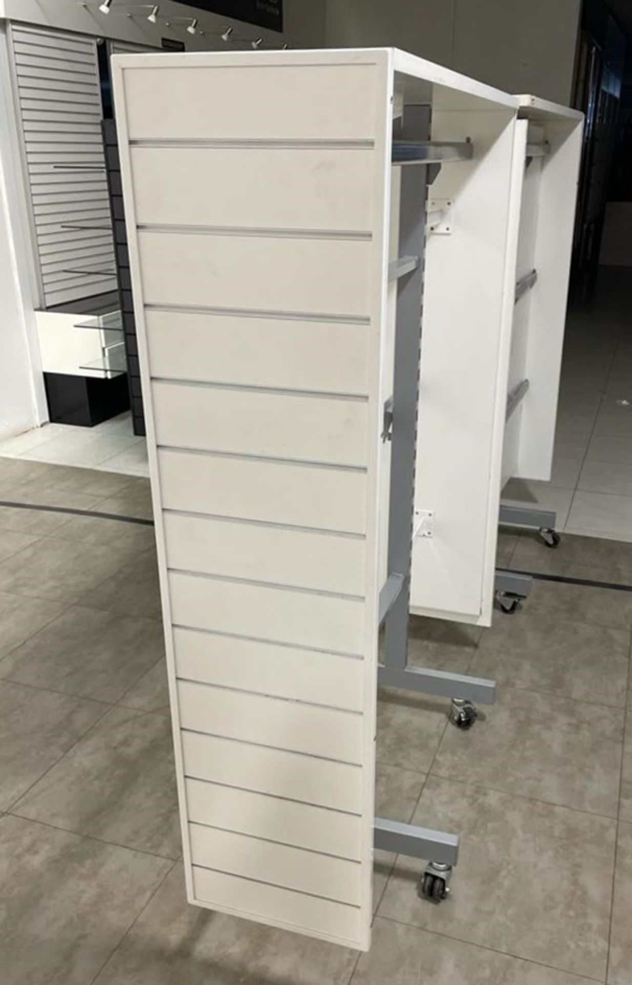 2 x Retail Display Units in White Featuring Clothes Rails, Slat Walls and Castor Wheels - Size - Image 2 of 5