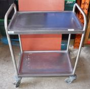 1 x Stainless Steel Two Tier Trolly With Anti Spill Shelves, Castor Wheels and Push/Pull Handles -