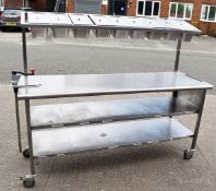 1 x Stainless Steel Mobile Prep Bench Featuring Overhead Pizza Topper Shelf With 9 Gastro Topper