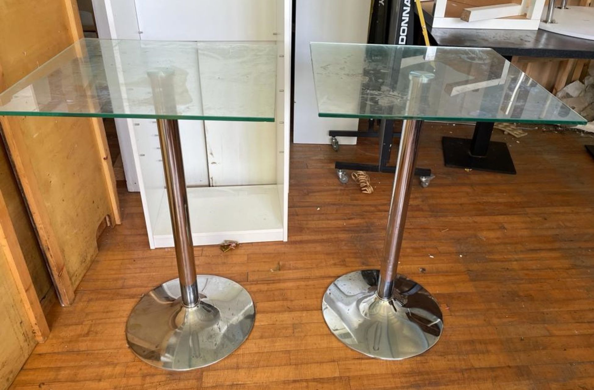 4 x Poseur Tables Features Chrome Bases and Glass Tops - CL667 - Location: Brighton, Sussex,