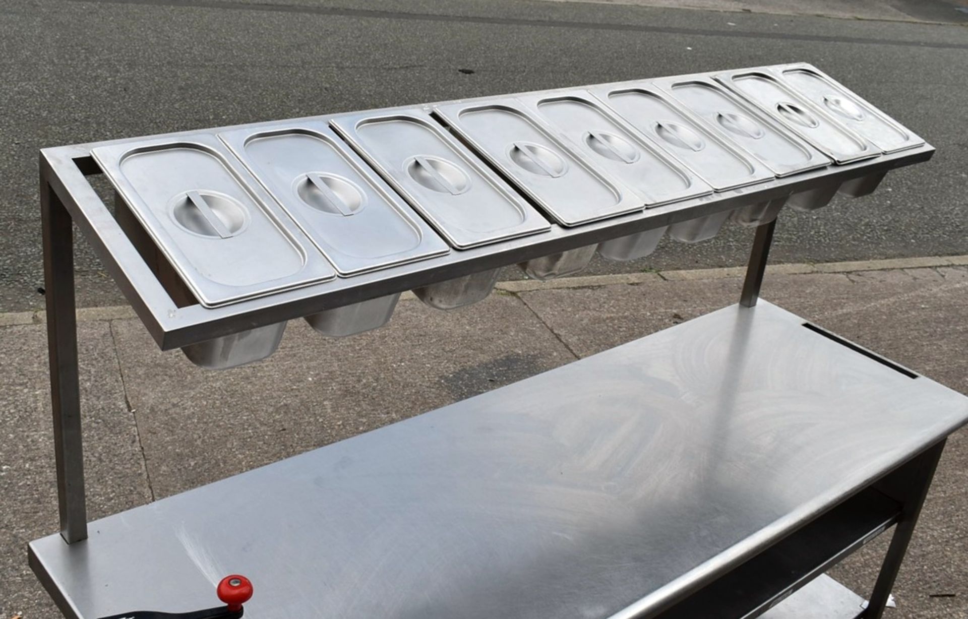 1 x Stainless Steel Mobile Prep Bench Featuring Overhead Pizza Topper Shelf With 9 Gastro Topper Pan - Image 8 of 17