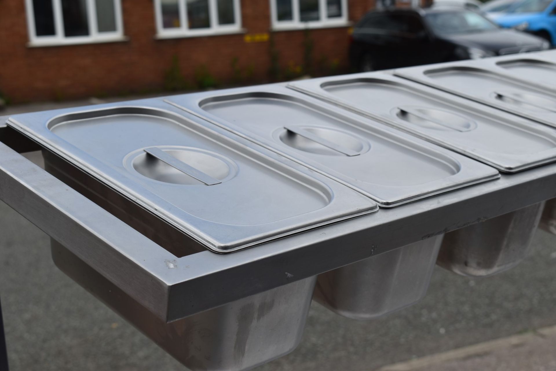 1 x Stainless Steel Mobile Prep Bench Featuring Overhead Pizza Topper Shelf With 9 Gastro Topper Pan - Image 5 of 17