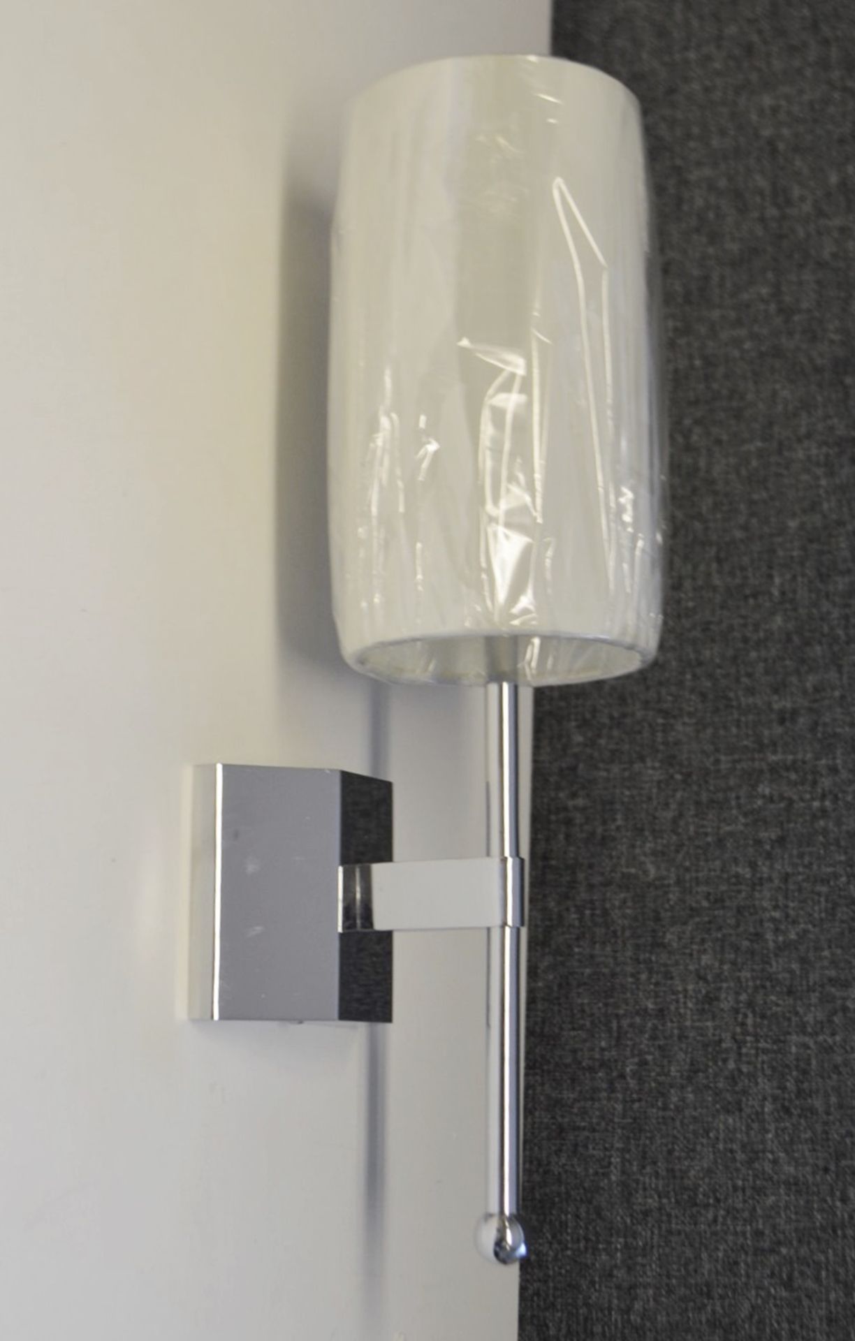 1 x CHELSOM Wall Light In A Chrome Finish With A Silk Shade - Unused Boxed Stock - Dimensions: