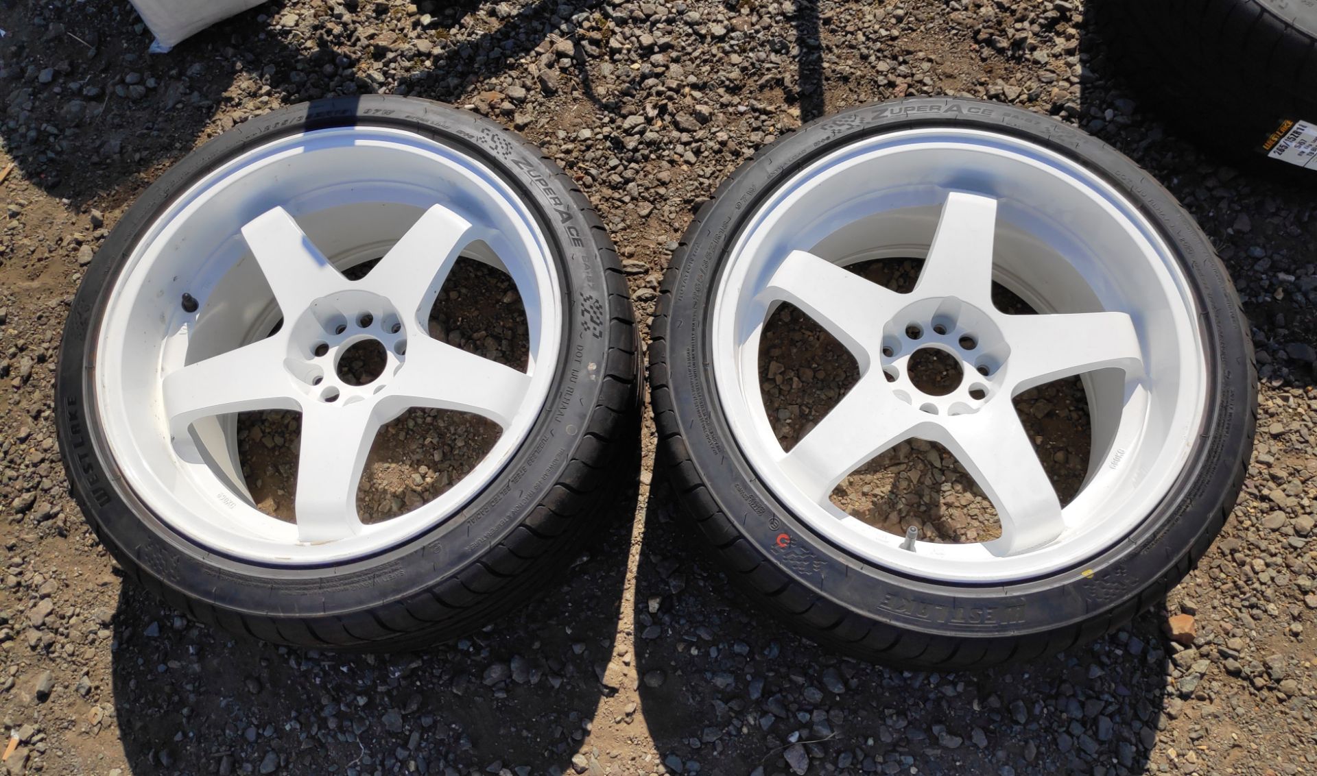 2 x White 5-Spoke 18 x 10 ET12 Wheels with 265 35 R18 Tyres For Nissan 350Z - CL682 - Location: Bedf