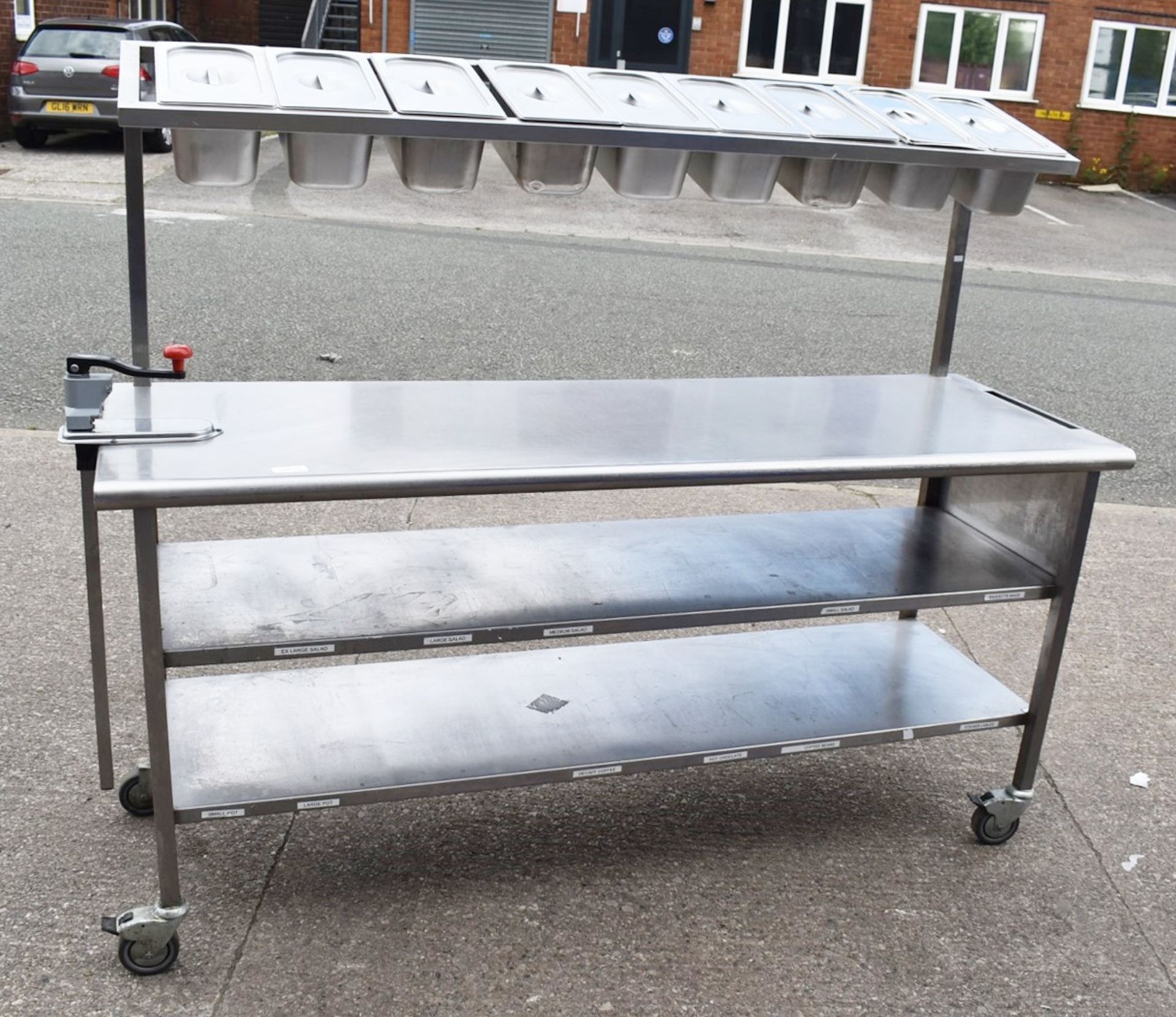 1 x Stainless Steel Mobile Prep Bench Featuring Overhead Pizza Topper Shelf With 9 Gastro Topper Pan - Image 12 of 17