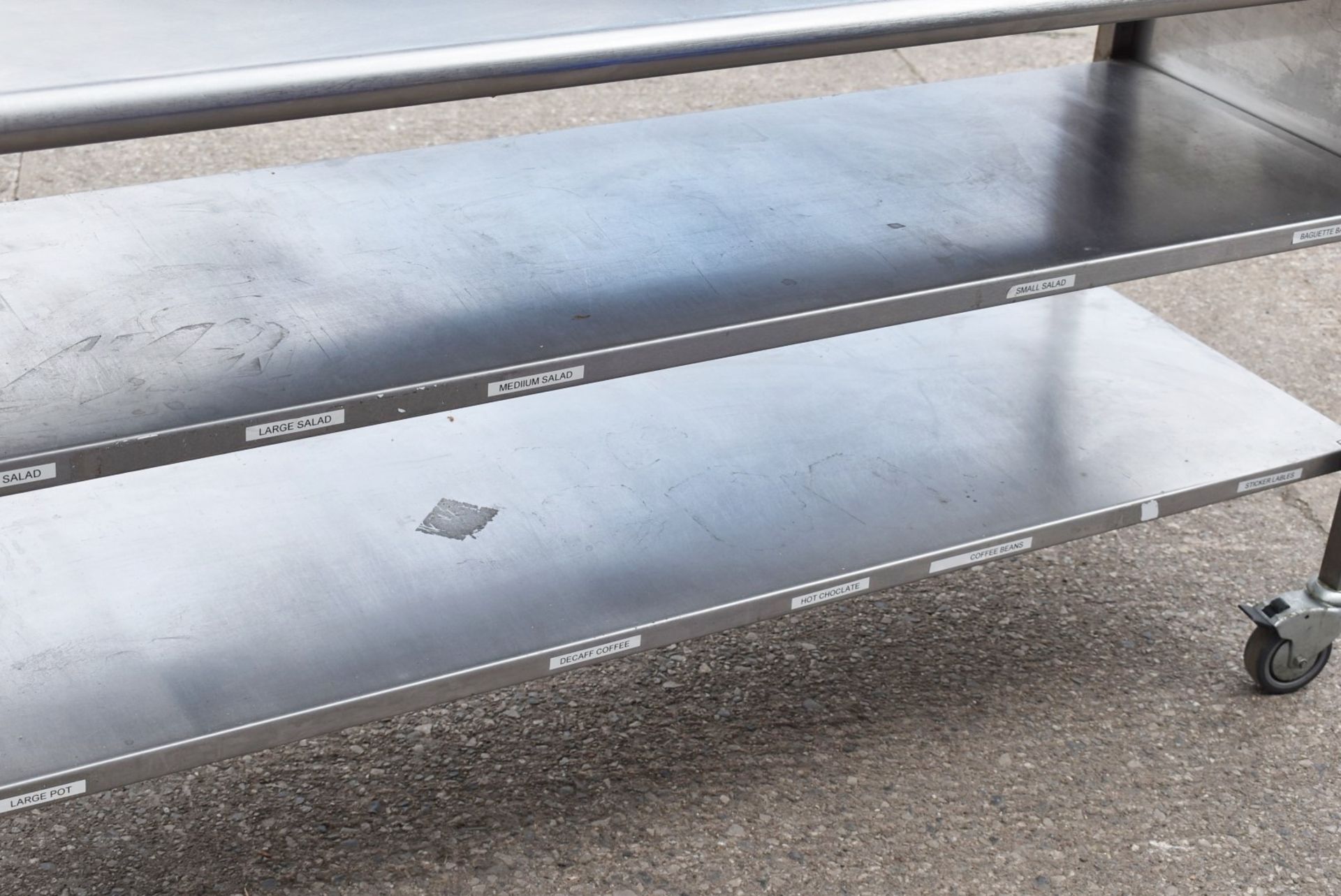 1 x Stainless Steel Mobile Prep Bench Featuring Overhead Pizza Topper Shelf With 9 Gastro Topper Pan - Image 4 of 17