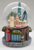 1 x Harrods Musical Snowglobe - Dimensions: Height 15cm / Diameter 10cm - Ref: HHW16/JUL21/PAL-B -