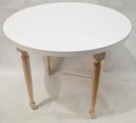 2 x Round Event Tables - Each Features Attractive Turned Legs In Beech Wood And A White Top