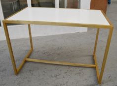 1 x High Display Table With A Sturdy Metal Base In Gold - Dimensions: H92 x W130 x D75cm