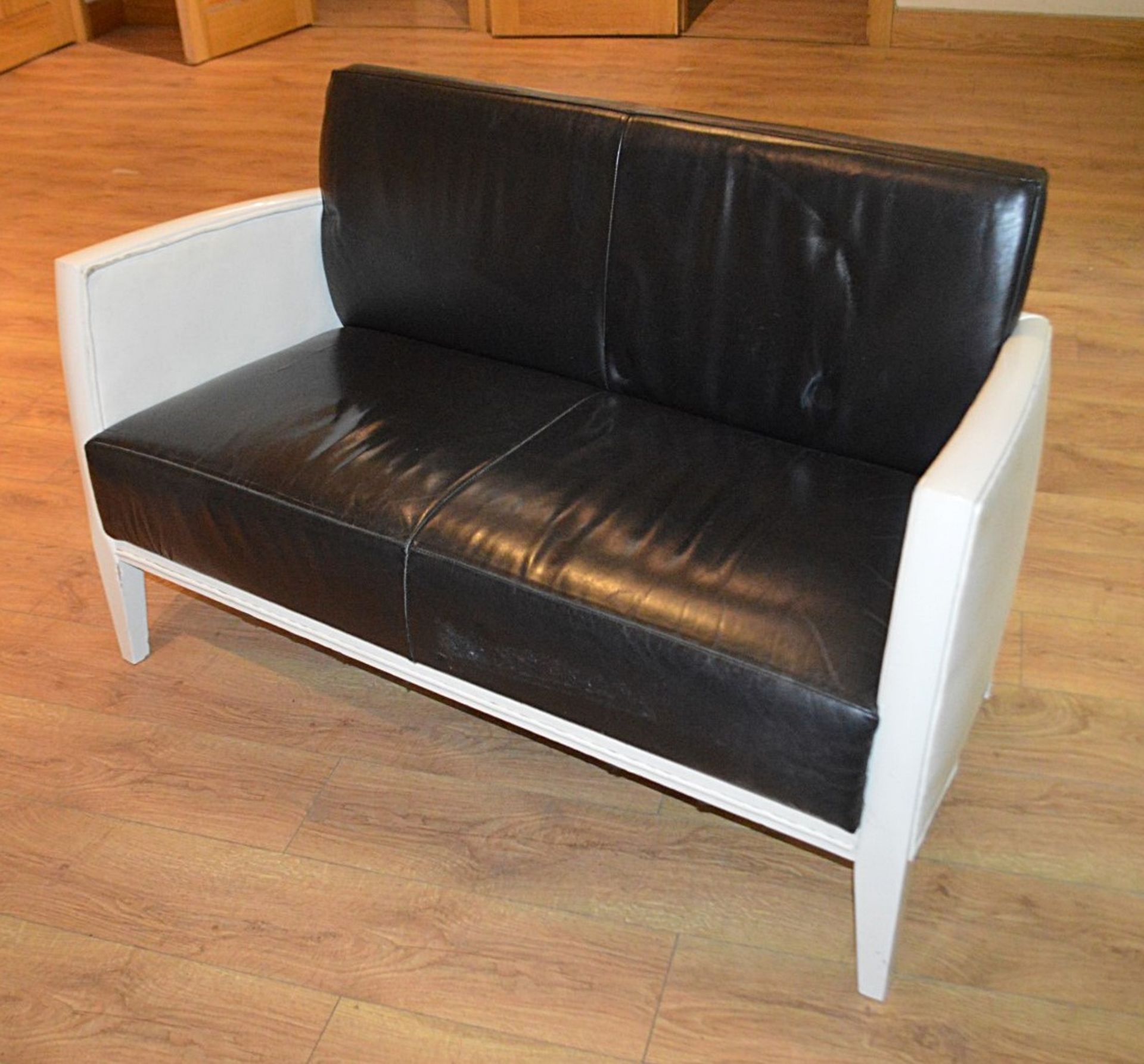 1 x Stylish Commercial Leather Upholstered 2-Seater Sofa With A High-Gloss Patent-Style Finish On