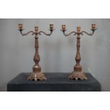 Couple of candlesticks in cast iron H43x30