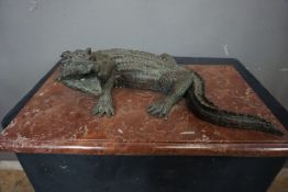 Crocodile in bronze on base in marble H57x36