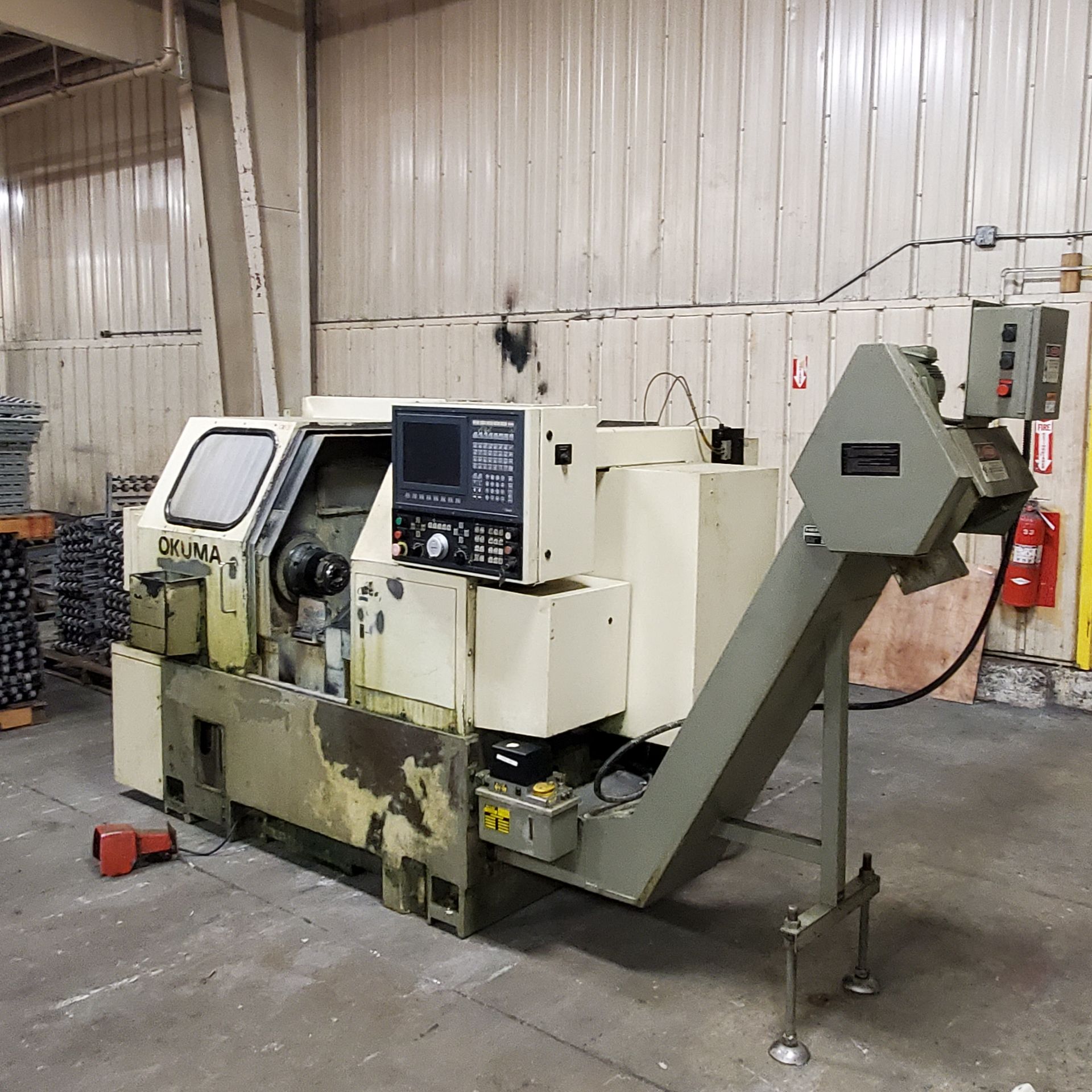 Okuma LNC-8 CNC Lathe, 12 Station Turret, OSP 5020 Control, Micro Centric CB65-NDR Collet Chuck, s/n