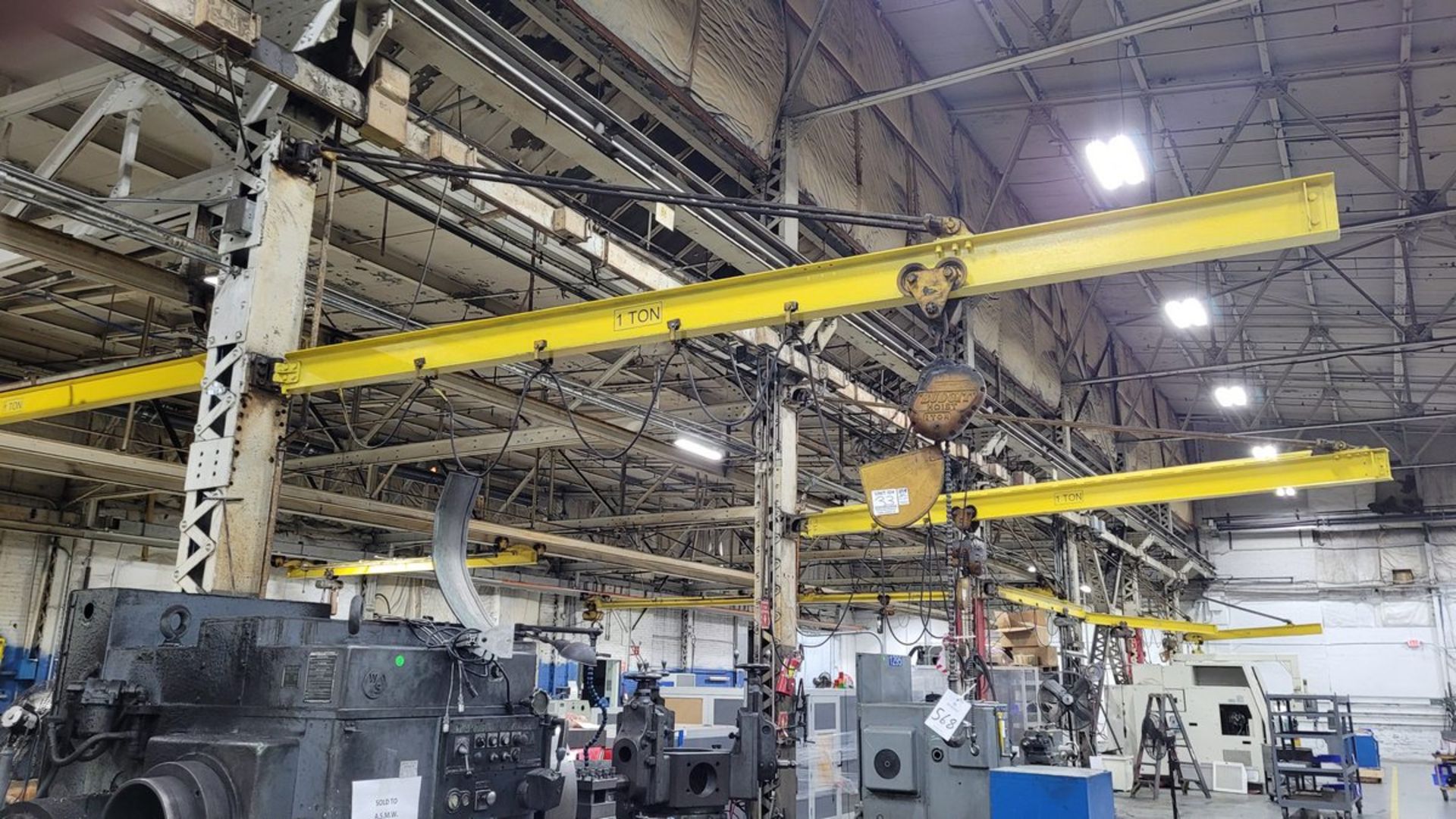 (2) Assorted Jib Cranes,(1) 1 Ton Budgit Electric Chain Hoist, Beam Mounted 20' Jib with (2)