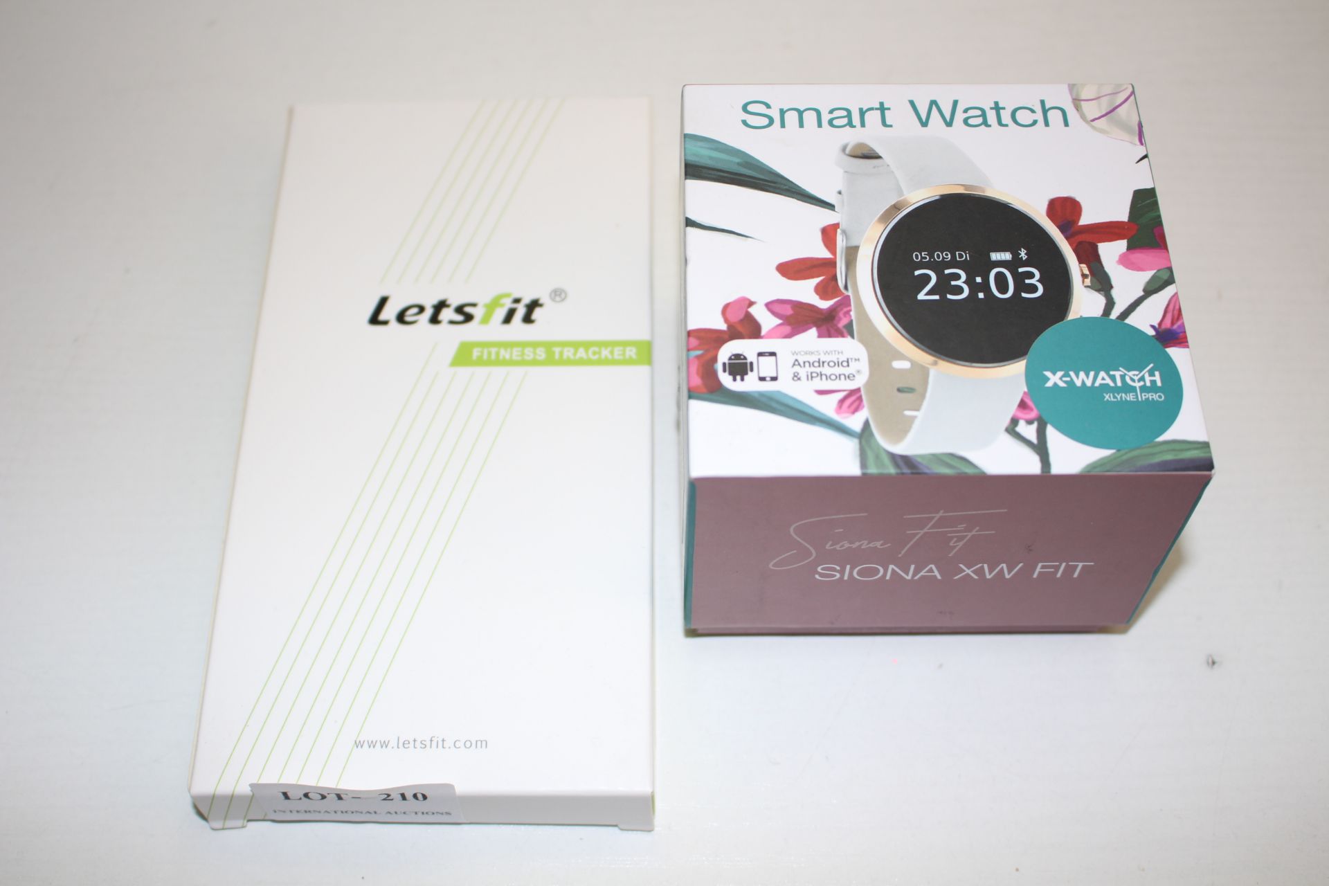 2X ASSORTED BOXED ITEMS TO INCLUDE SIONA XW FIT SMART WATCH & LETSFIT FITNESS TRACKER Condition