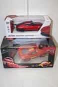 2X BOXED ASSORTED RC SPORTS CARS ASTON MARTIN & TURBO RACER Appraisal Available on Request- All