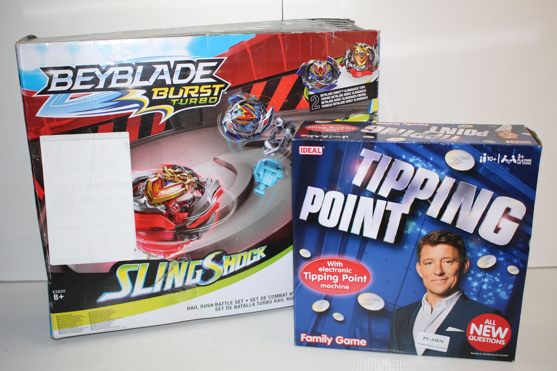 2X BOXED TOYS TO INCLUDE BEBLADE BURST TURBO & TIPPING POINT BOARD GAMECondition ReportAppraisal
