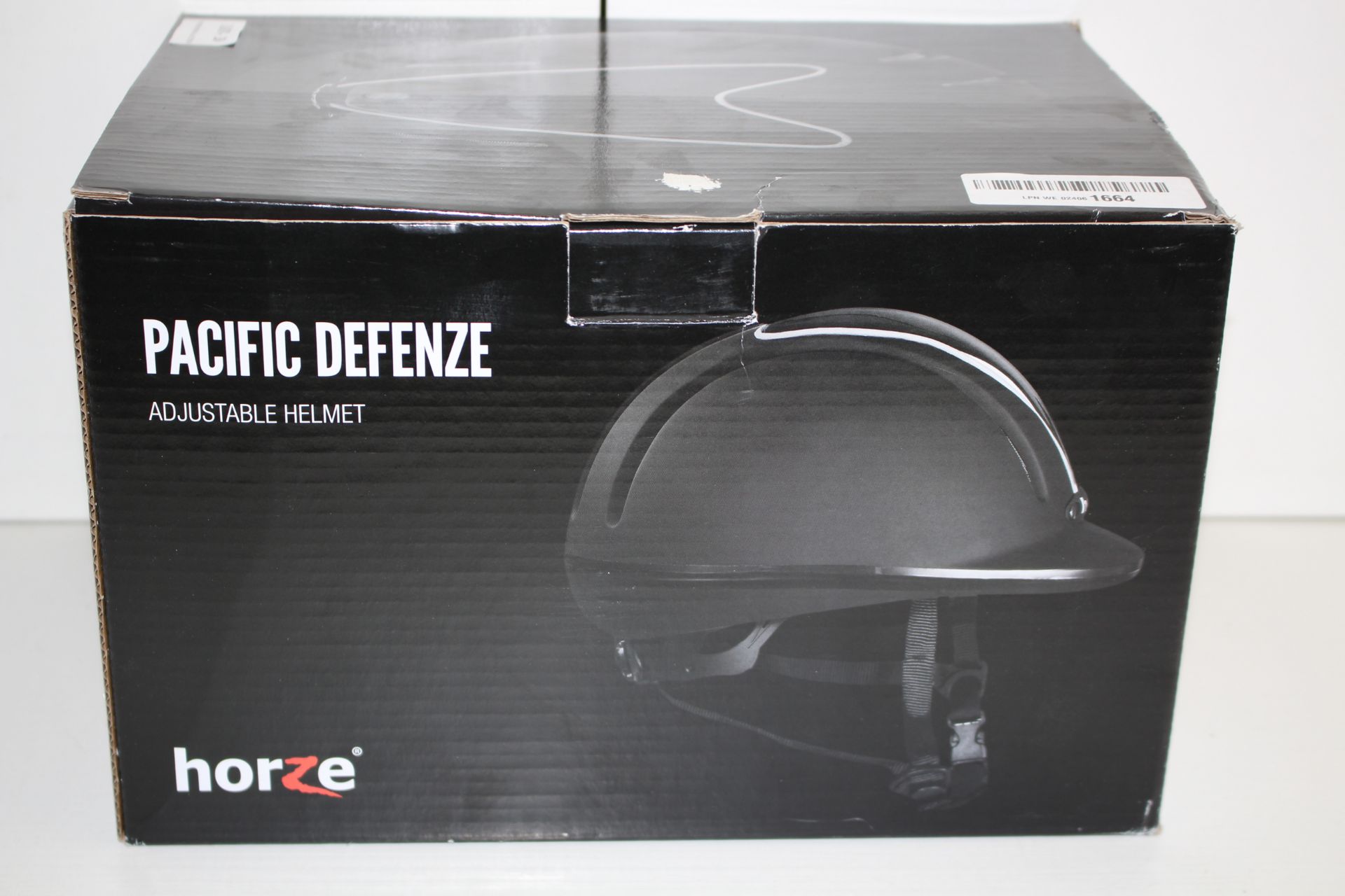 BOXED HORZE PACIFIC DEFENZE ADJUSTABLE HELMET RRP £48.13Condition ReportAppraisal Available on