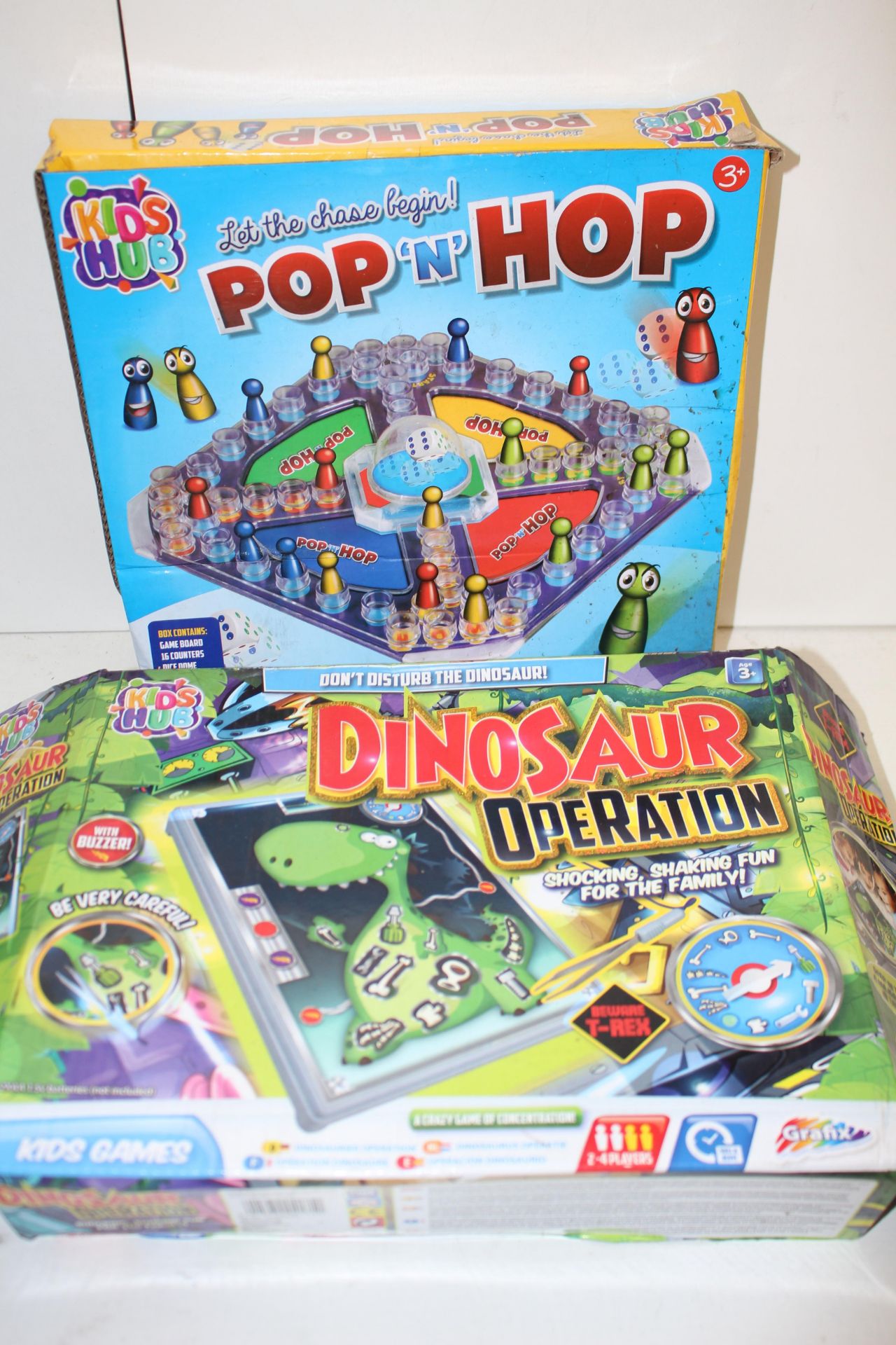 X 2 ITEMS DINO OPERATION AND HOP AND POP GAMECondition ReportAppraisal Available on Request- All