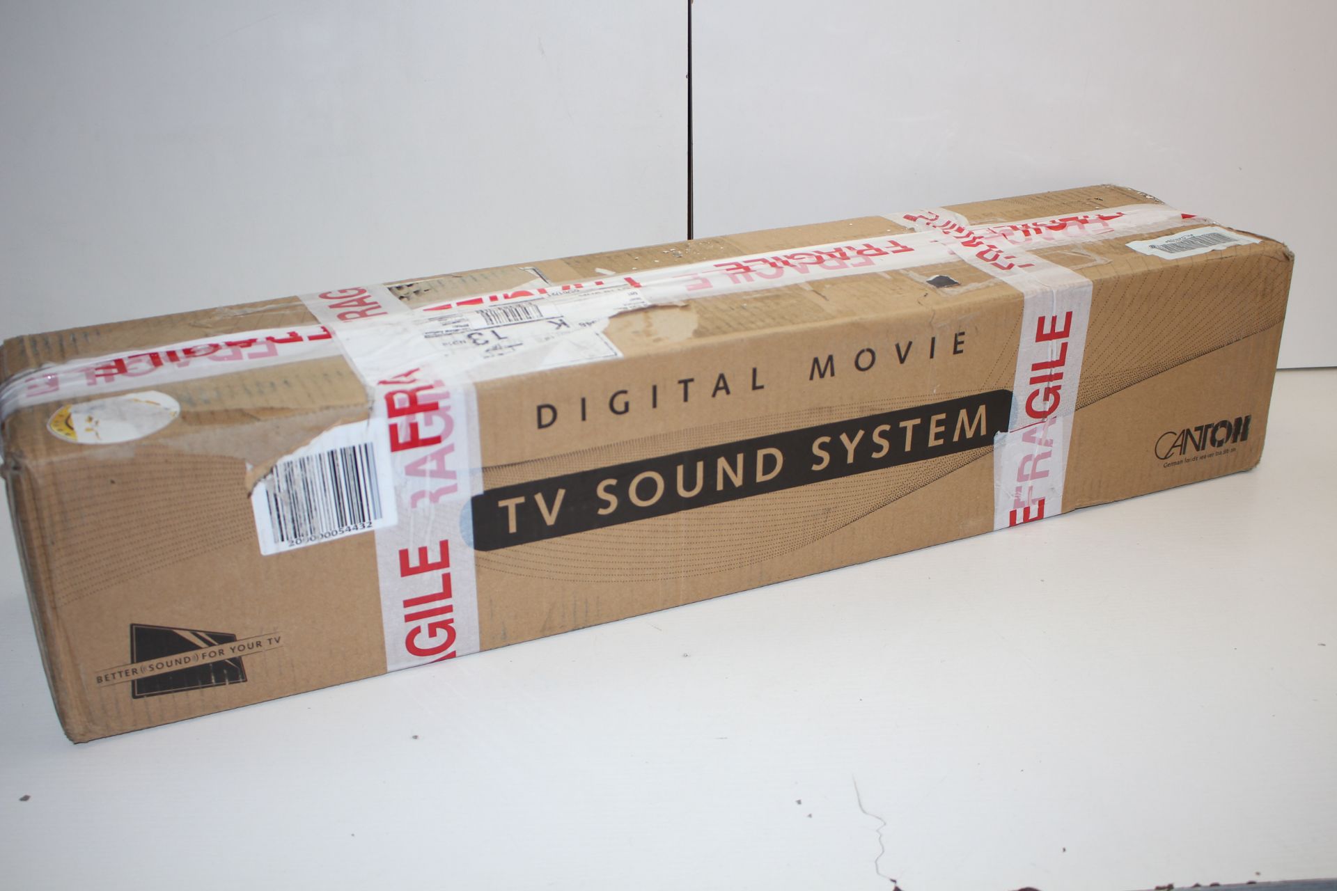 BOXED CANTON DM5 BLACK GLASS DIGITAL MOVIE TV SOUND SYSTEM RRP £331.04Condition ReportAppraisal