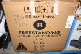 BOXED RUSSELL HOBBS FREESTANDING TABLE TOP FREEZER BLACK RRP £110.00Condition ReportAppraisal