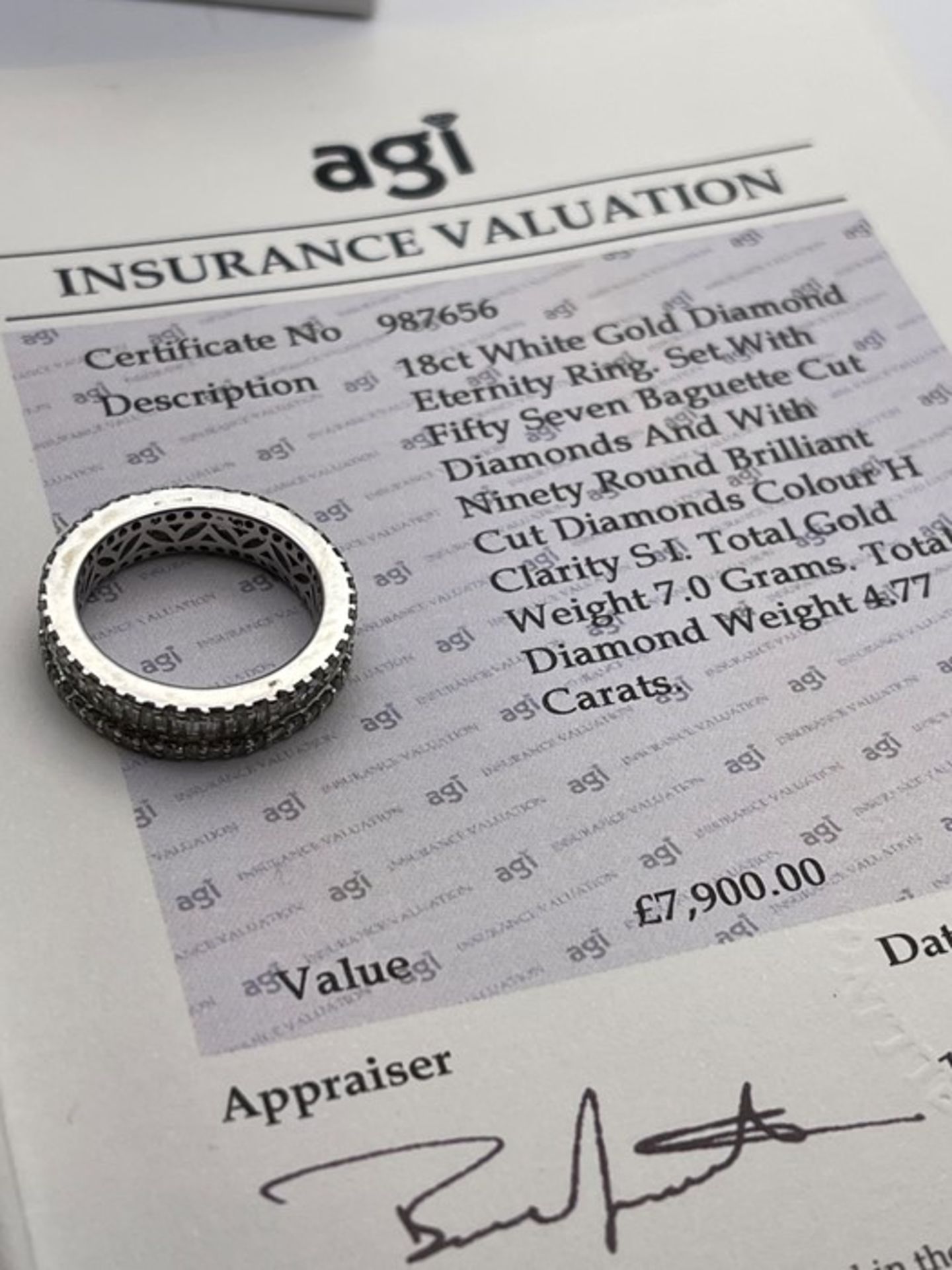 ***£7900.00*** 18CT WHITE GOLD DIAMOND FULL ETERNITY RING, SET WITH FIFTY SEVEN BAGUETTE CUT - Image 5 of 5
