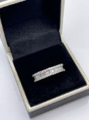 ***£7900.00*** 18CT WHITE GOLD DIAMOND FULL ETERNITY RING, SET WITH FIFTY SEVEN BAGUETTE CUT