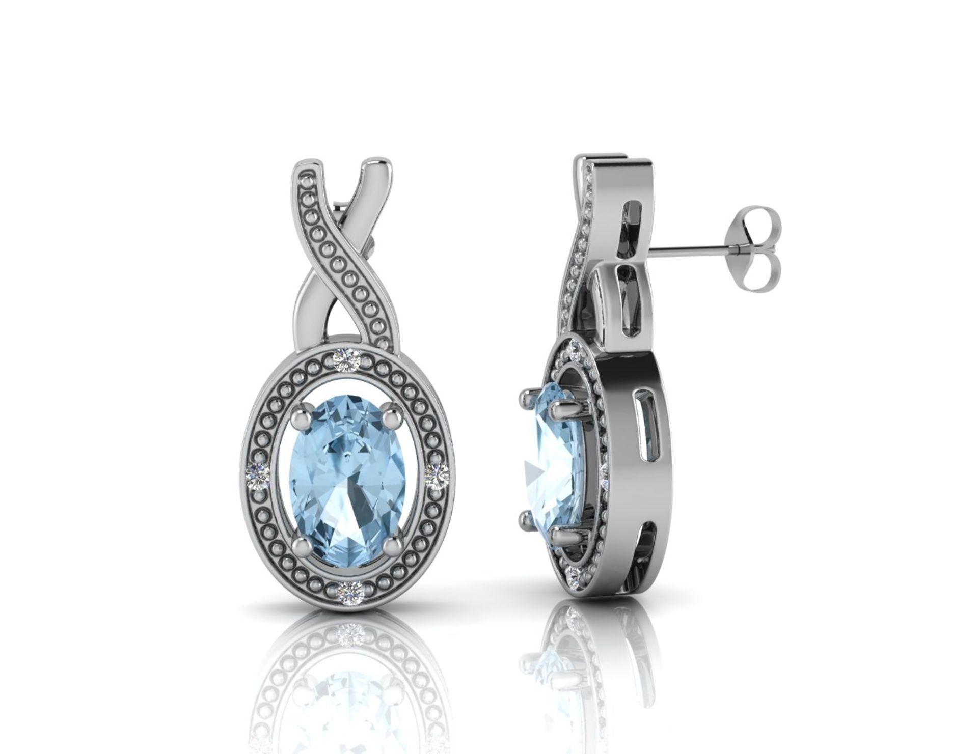 9ct White Gold Diamond And Blue Topaz Earring 0.03 Carats - Valued by GIE £859.00 - An oval Blue