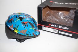 BOXED RALEIGH RASCAL HELMET WITH TAGS RRP £31.99Condition ReportAppraisal Available on Request-