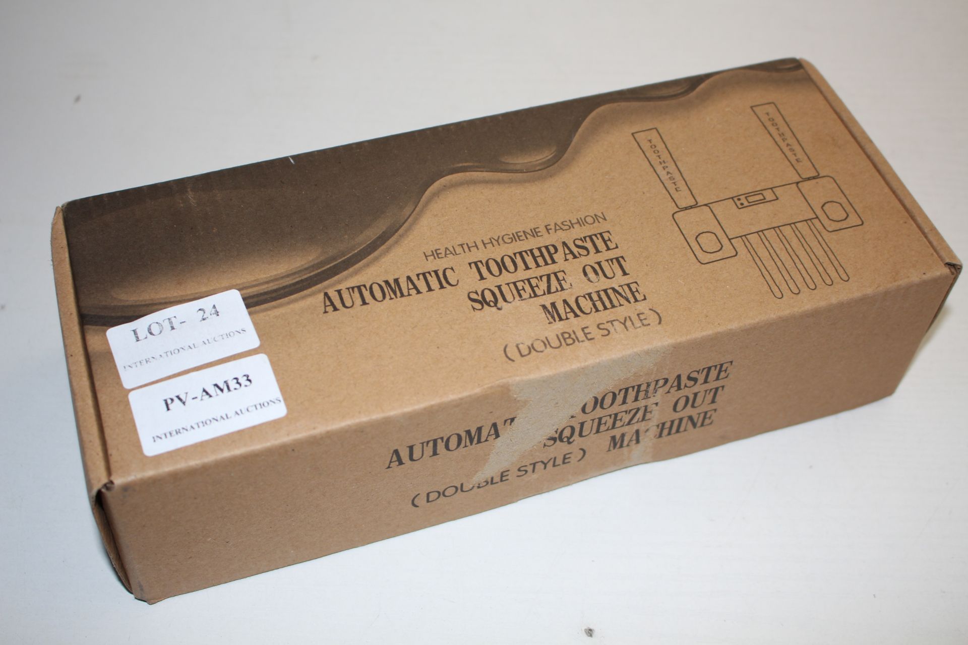 BOXED AUTOMATIC TOOTHPASTE SQUEEZE OUT MACHINECondition ReportAppraisal Available on Request- All
