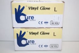 2X BOXED CURE GUARD VINYL GLOVES SIZE LARGE Condition ReportAppraisal Available on Request- All