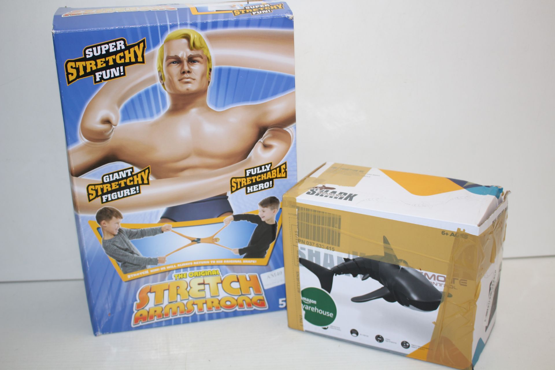 2X BOXED ASSORTED ITEMS TO INCLUDE STRETCH ARMSTRONG & RC SHARK (IMAGE DEPICTS STOCK)Condition