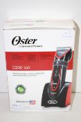 BOXED OSTER C200 ION PROFESSIONAL CORD/CORDLESS RECHARGEABLE CLIPPER RRP £219.60Condition