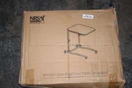 BOXED NRS HEALTHCARE OVERBED/CHAIR TABLE - WHEELED RRP £44.99Condition ReportAppraisal Available