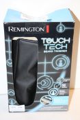 BOXED REMINGTON TOUCH TECH BEARD TRIMMER RRP £79.00Condition ReportAppraisal Available on Request-