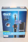 BOXED ORAL B POWERED BY BRAUN PRO 2 BLACK EDITION 2500 TOOTHBRUSH RRP £32.49Condition