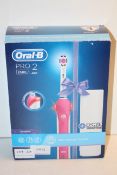 BOXED ORAL B POWERED BY BRAUN PRO 2 TOOTHBRUSH 2500 RRP £39.99Condition ReportAppraisal Available on