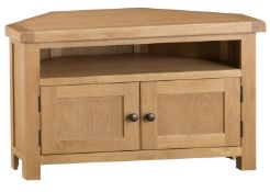 BOXED WESTCOTE CORNER TV UNIT IN OAK RRP £129.99Condition ReportAppraisal Available on Request-