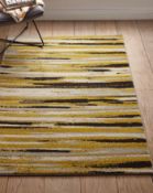 BAGGED OCHRE BURSH RUG 120X170 RRP £37.99Condition ReportAppraisal Available on Request- All Items