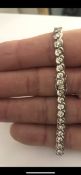 18 carat White Gold Flat Kerb Line Bracelet set with 5 carats of White Round Diamonds