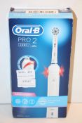 BOXED ORAL B PRO 2 POWERED BY BRAUN 2000 TOOTHBRUSH RRP £29.99Condition ReportAppraisal Available on