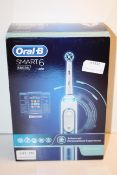 BOXED ORAL B POWERED BY BRAUN SMART 6 TOOTHBRUSH 6000N RRP £129.99Condition ReportAppraisal