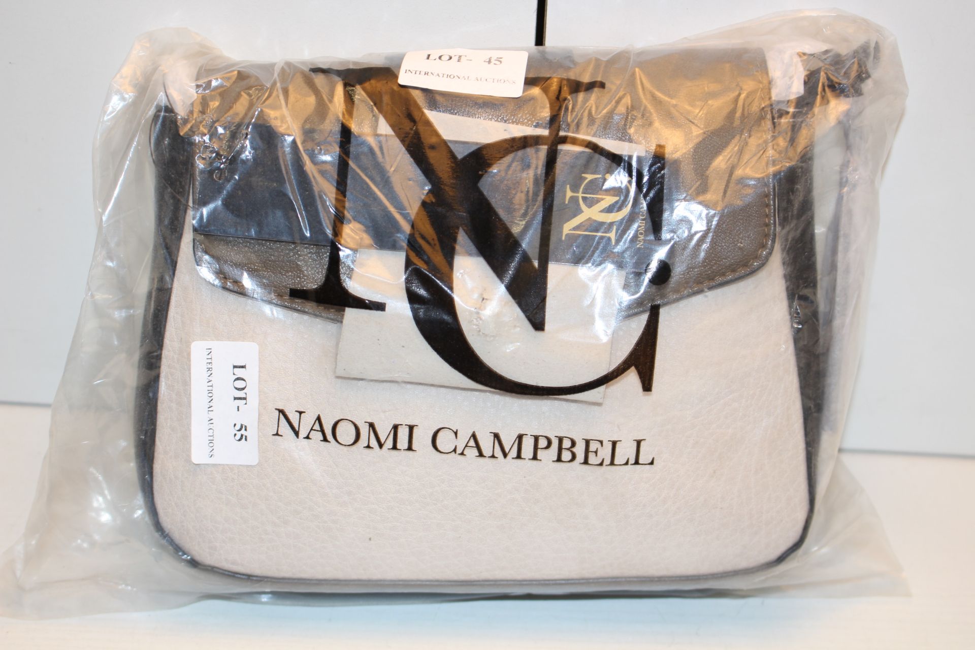 BAGGED BRAND NEW NAOMI CAMPBELL COLLECTION SUEDE/LEATHER HANDBAG RRP £49.99Condition ReportAppraisal