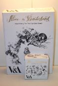2X BOXED ALICE IN WONDERLAND FINE CHINA ITEMS TO INCLUDE 3 TIER TEA CUP CAKE STAND & OTHER (IMAGE
