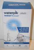 BOXED WATERPIK WATER FLOSSER CORDLESS ADVANCED RRP £79.00Condition ReportAppraisal Available on