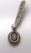 9 carat Yellow Gold Pendant set with Garnet