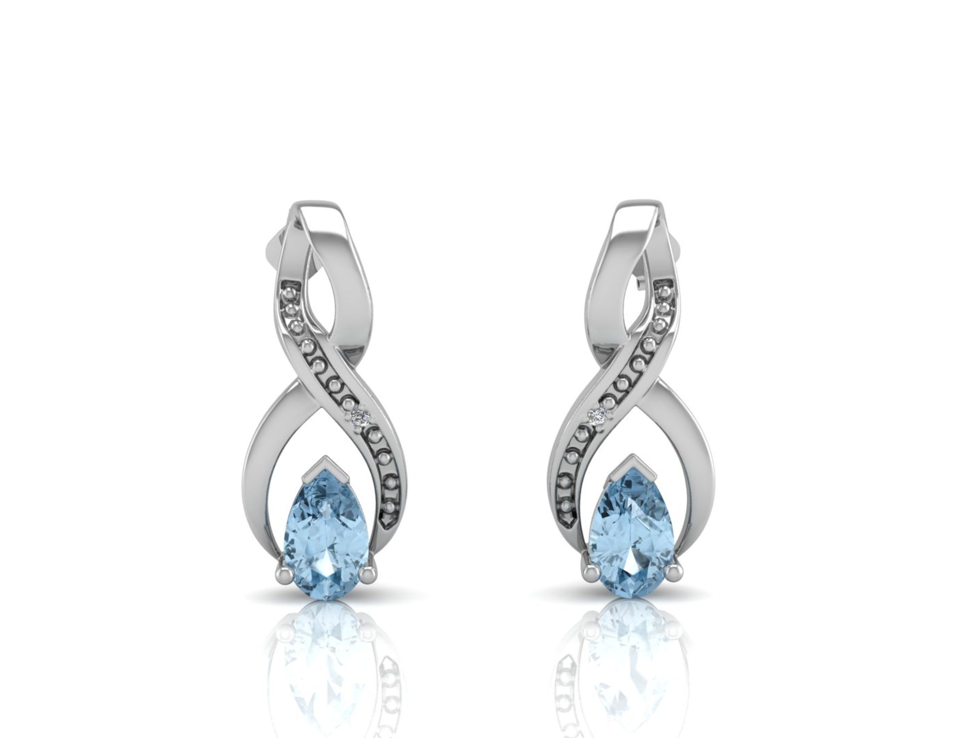 9ct White Gold Diamond And Blue Topaz Earring 0.01 Carats - Valued by GIE £950.00 - 9ct White Gold - Image 3 of 4