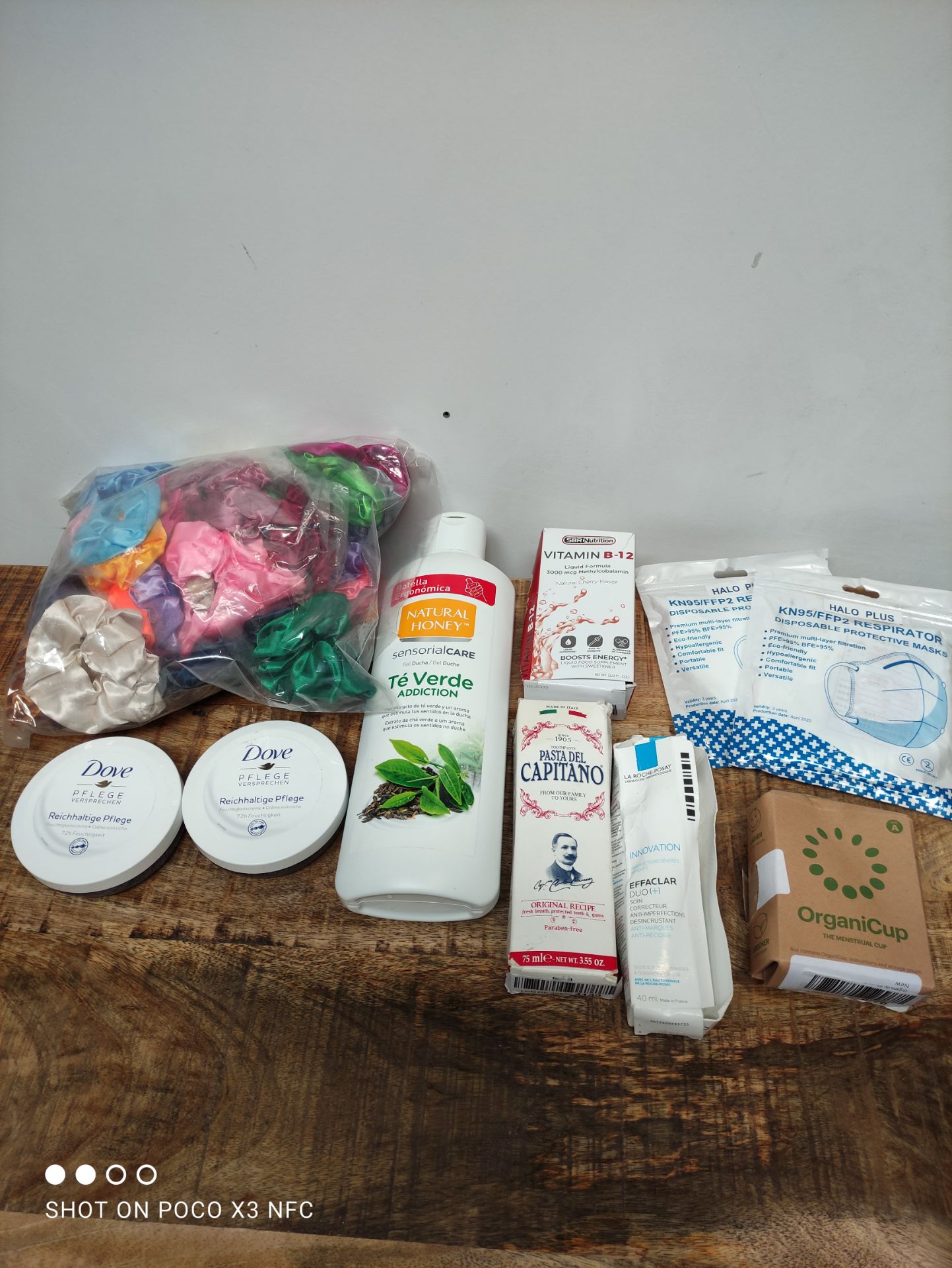 1 LOT TO CONTAIN 10 ASSORTED ITEMS TO INCLUDE SCRUNCHIES/MENSTRUAL CUP AND MORE(IMAGE DEPICTS